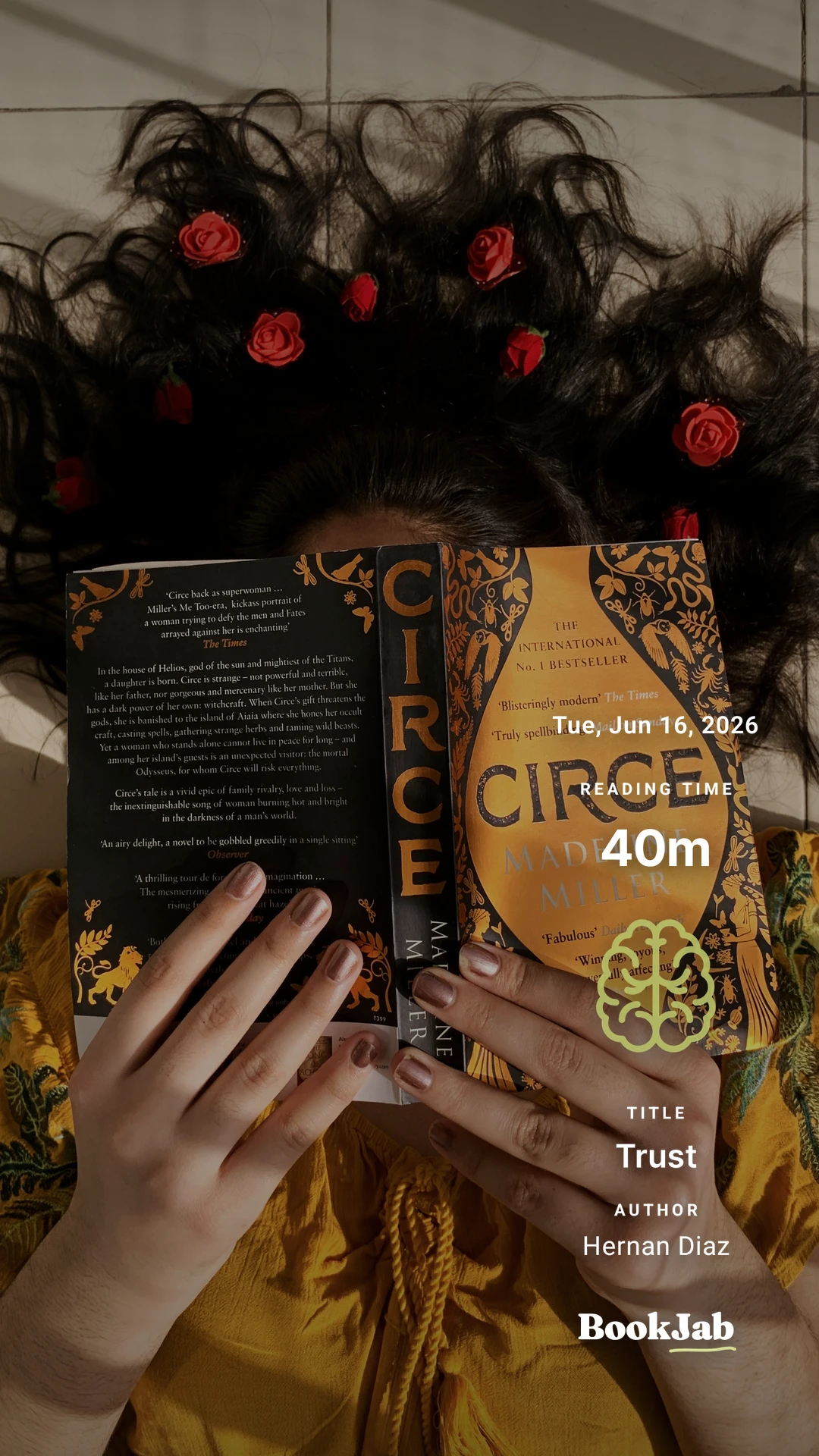 Trust · 40m — holding a copy of Circe