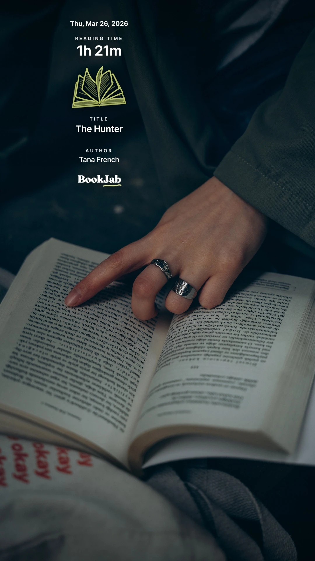 The Hunter · 1h 21m — a ringed hand resting on open pages