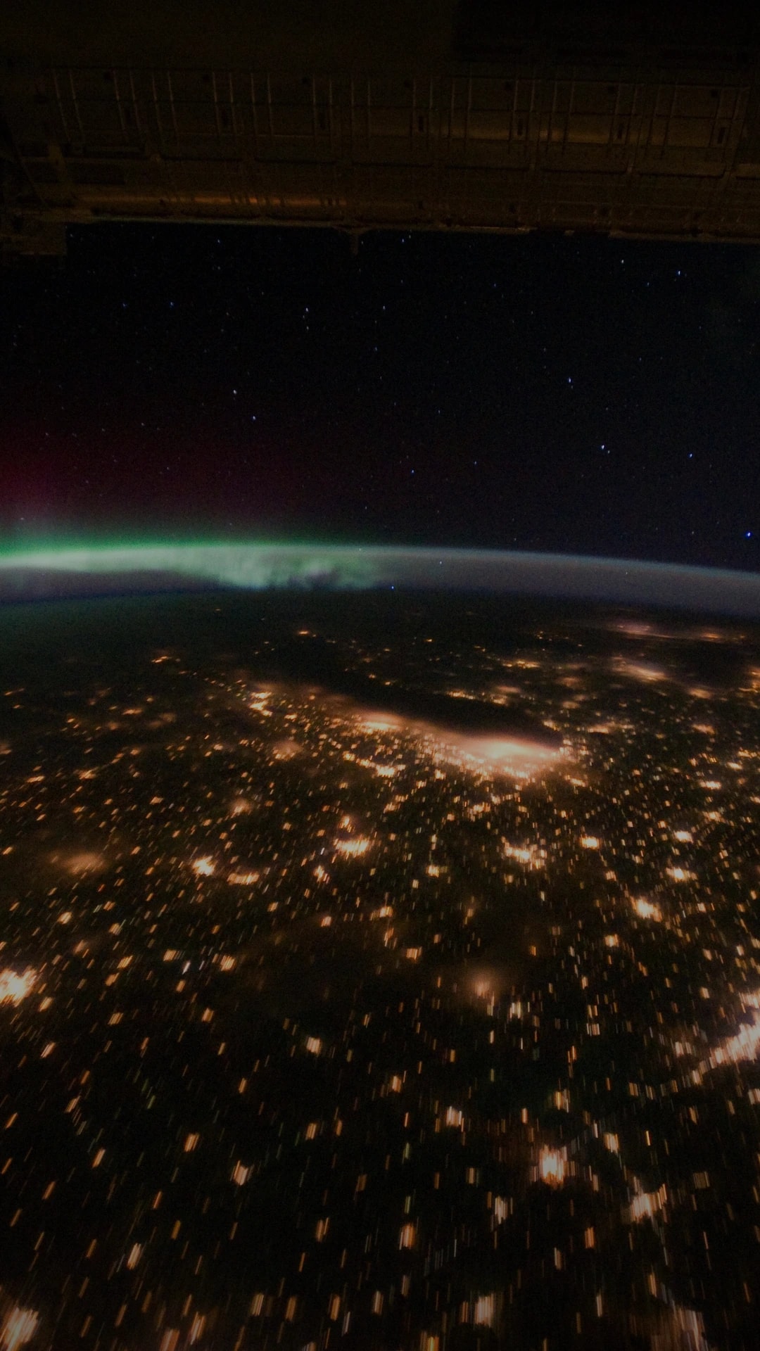 Sapiens · 1h 30m — aurora over city lights